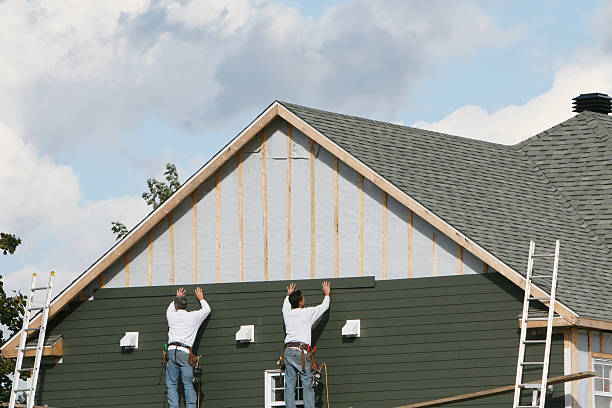 Professional Siding technician working in Commodore, PA